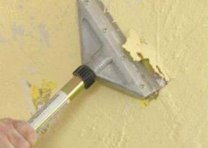 Скребок для снятия краски со стен